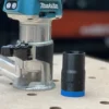 Makita router dust port adapter to use your shop vac with your 18v router