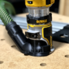 Use your Festool 27mm and 36mm hose with the Dewalt 20v router dust port