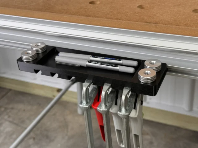 Store your pencils, bench dogs and Festool quick clamp racks on the side of your MFT table