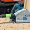 Use your Festool 27mm hose with the Makita plunge track saw