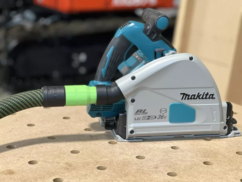 Use your Festool 27mm hose with the Makita plunge track saw