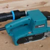 Keep your shop clean when using the Makita belt sander with the ToolCurve hose adapter