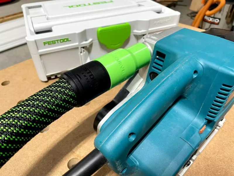 Use your Festool 27mm hose with your Makita 9903 & 9904 belt sander