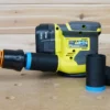 Ryobi 18v sander usually bought at home depot is a great sander for weekend warriors and our shop vac hose adapter works great with it.