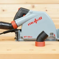 ToolCurve No Snag Dust Port Adapter attached to a Mafell MT 55cc track saw, with hose connected and angled upward